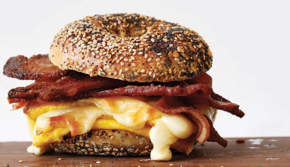 Gourmet breakfast food catering Philadelphia-style featuring bacon, egg and cheese in sesame bagels